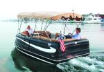 Duffy Electric Boat : Duffy Cat 16 - seats 10 adults - available open with the bimini top as shown or with an enclosed cabin
